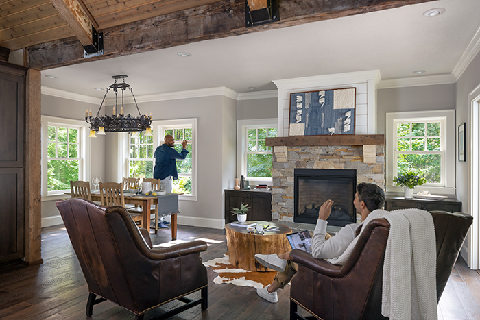 Man Admiring Double Hung Window