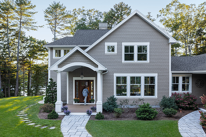 Front of homes with new Renewal by Andersen windows and doors.